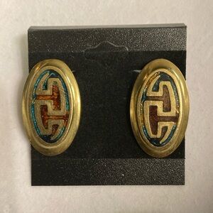 Vintage brass clip on earrings with inlay stones . Semi glows under black light